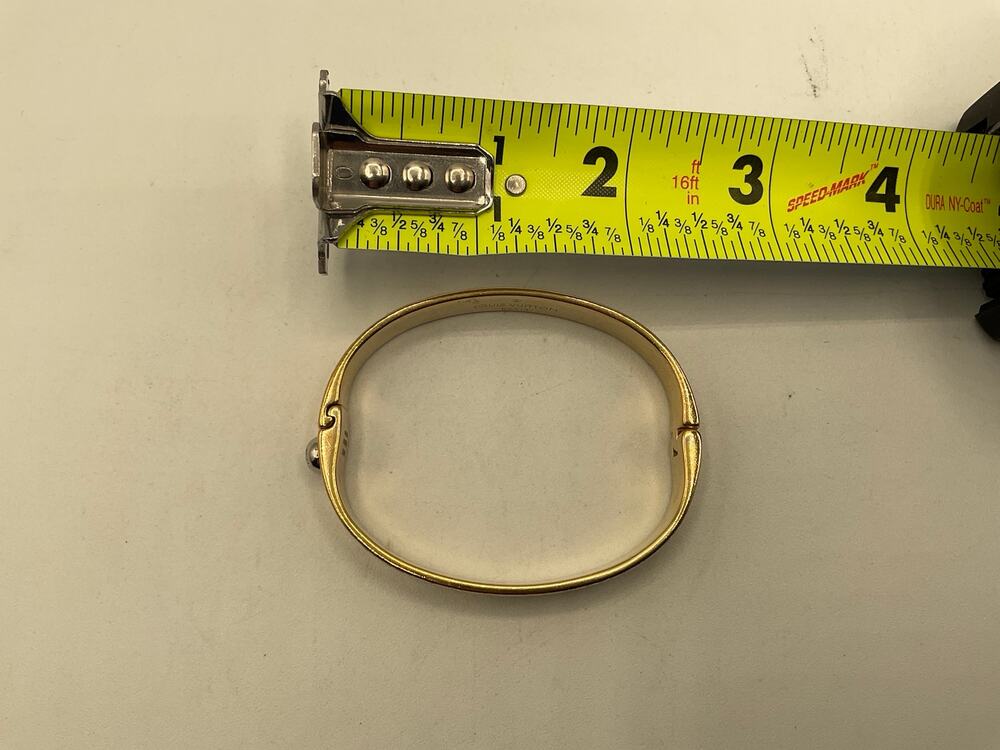 Louis Vuitton Gold colored bracelet -  about 2 1/2 wide